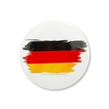 Glossy German flag badge with artistic brush strokes on a minimalist white background - Artistic Brushstroke Flag