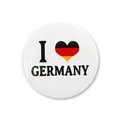 Close-up of a white badge with 'I Love Germany' text and a German flag heart design - Heart Germany Design