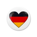 Close-up of heart-shaped Germany flag badge with smooth glossy finish on white surface - Large Heart Flag