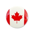 Detail view of round Canada flag tinplate badge with shiny finish and red maple leaf - 58mm / Standard Flag Style