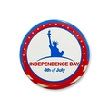 Macro detail of July 4th tin badge with Statue of Liberty and Independence Day text - Statue of Liberty Style