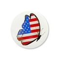 Detailed view of round tinplate badge featuring a patriotic American flag butterfly design - Butterfly Flag Style