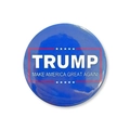 Macro detail of a round blue tinplate badge with Trump slogan and stars decor - Trump Campaign Style