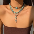 Details des mehrlagigen Boho-Halsketten-Sets mit Türkisperlen und Bullenschädel-Anhänger - Bulle Totenkopf Lederkordel Mehrlagiges Set (5060)