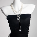 Detail of multi-layer faux pearl brooch chain with baroque pearls on a white mannequin - Long Multi-Layer Baroque Pearl Style (00081) / Silver