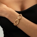 Polished gold irregular oval link chain bracelet on a model wrist for fashion style - Gold Large Oval Link Chain Bracelet (3042)