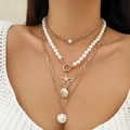 Bohemian multi-layer gold necklace with starfish, seashells and pearl chain accents - Gold (5017)