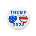 Round white button badge with blue TRUMP 2024 text and American flag aviator sunglasses - Trump 2024 Aviator Sunglasses Style