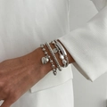 Layered silver bracelet set with heart charms and pearls worn over a white suit - Silver Artificial Pearl Heart (06847)