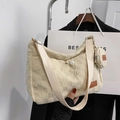 Cream quilted hobo bag with adjustable drawstring and matching mini round coin purse - Khaki