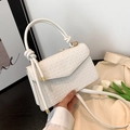 Witte geweven crossbodytas met geknoopt handvat en gouden details voor dames - Wit