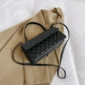 Classic black quilted rectangular crossbody bag with golden hardware and top handle - Black