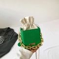 Green woven bucket bag with cream drawstring liner and chunky gold chain strap - Green
