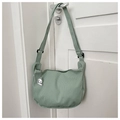 Detail of mint green corduroy crossbody bag with soft texture and cute puppy pendant - Green (With Dog Pendant)