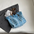 Blue and white woven checkered tote bag with tassels and dark brown faux leather handles - Blue