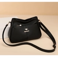 Elegant black lychee leather tote bag with golden kangaroo hardware for women - Black
