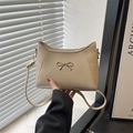 Chic beige crescent bag with gold bow clasp and PU leather shoulder strap - White