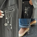 Stylish silver tassel brooch with star and pearl charms for versatile fashion styling - Silver-00319