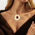 Vintage golden choker necklace with a hammered round pendant and red gemstone inlay - Circular Hammered Pendant Choker (7515)