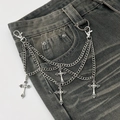Detail view of gothic multilayer metal chains with vintage cross pendants on denim pants - Silver Vintage Cross Chain (00093)
