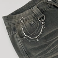 Detail of layered silver chain accessory with stars and moon on denim jeans - Silver Star Moon Multi Chain (00096)