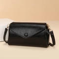 Bolso bandolera cuadrado negro con hebilla redonda dorada y solapa tipo sobre moda - Negro