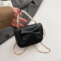 Elegant black PU leather handbag with pearl handle and leather bow detail - Black