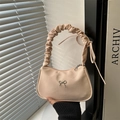 Elegant beige underarm bag with scrunchie handle and silver butterfly bow detail - Pink
