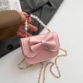 Pink mini handbag with large bow, pearl handle, and gold chain strap for women - Pink