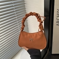 Caramel shoulder bag with pleated handle and silver bow accent for elegant women - Brown