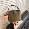 Olive green suede bucket bag with top handle and a cute white plush puppy charm - With Pendant / Green