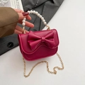 Mini magenta crossbody bag with large bow, pearl bead handle and gold chain strap - Red