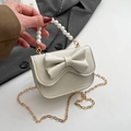 Elegant cream shoulder bag with pearl handle, bow detail, and gold chain strap - White