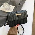 Classic black woven crossbody bag with a striking gold H-shaped metal buckle detail - Black