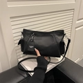 Minimalist black large capacity crossbody bag with side pockets and fashion tag detail - Black