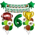 Detail of football party kit with trophy balloon, number 6, and themed banners for boys - Number 6 Set