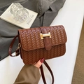 Commuter square crossbody bag in dark brown woven leather with golden buckle closure - Brown