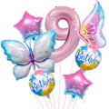 Detail of 40-inch pink number 9 foil balloon set with colorful gradient butterflies and stars - Number 9
