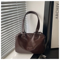 Chocolate brown waxed leather tote bag with glossy finish and silver hardware detail - Brown
