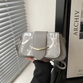 Minimalist grey flap bag with gold hardware and stylish geometric letter printing - Silver