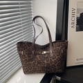 Large leopard print tote bag with dark brown straps and golden buckle detail - Leopard Print
