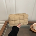 Quilted beige cosmetic bag with minimalist plaid stitching and gold zipper closure - Khaki
