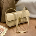 Chic beige patent leather underarm bag with gold metal clasp in a stylish retro design - Khaki