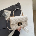 Chic beige quilted square crossbody bag with gold twist lock and elegant top handle - Off-white