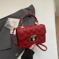 Elegant dark red quilted handbag with gold T-lock and adjustable shoulder strap - Burgundy