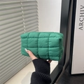 Quilted octagonal makeup bag in vibrant green with down filling and top zipper closure - Green