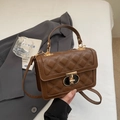 Brown quilted crossbody bag with diamond stitch pattern and gold metal clasp - Coffee