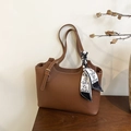 Dark brown pebble leather tote bag with elegant silk scarf and metal buckle detail - Brown