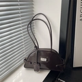Minimalist dark coffee half-moon shoulder bag in glossy faux leather with silver plaque - Coffee