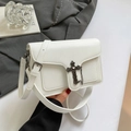 White lychee texture shoulder bag with gothic cross and chain metallic buckle detail - White